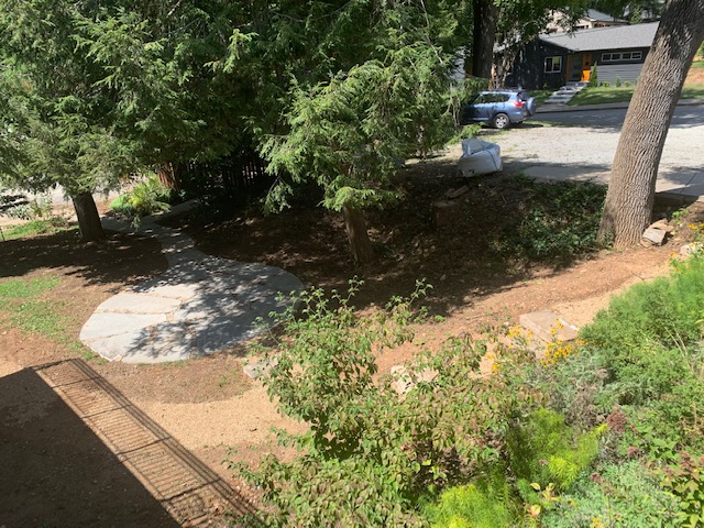 photo of paved patio in yard of UU Asheville