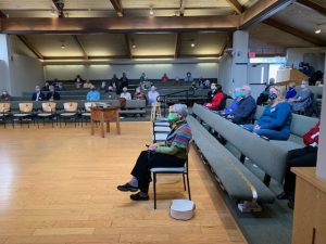 View of congregants in the 12/5 worship service, spread out