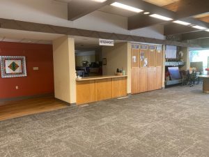 Photo of fellowship hall showing new gray carpeting