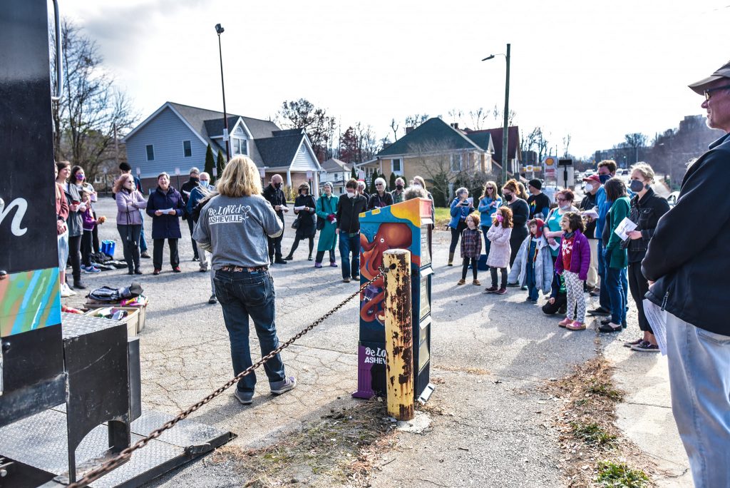 People gathered to hear a dedication of the UU Asheville/BeLoved Street Pantry on Charlotte Street